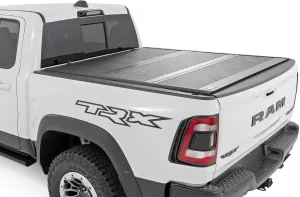 Rough Country Hard Tri-Fold Tonneau Cover for RAM 1500 (2019-2025)/1500 TRX (2021-2025) - Low-Profile Aluminum Truck Bed Cover, Fits 6'4 Bed (76.3") w/o Rambox